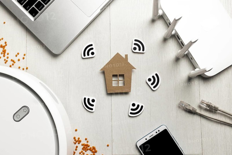 Top view wi fi router with house figurine wireless controlled devices. Resolution and high quality beautiful photo