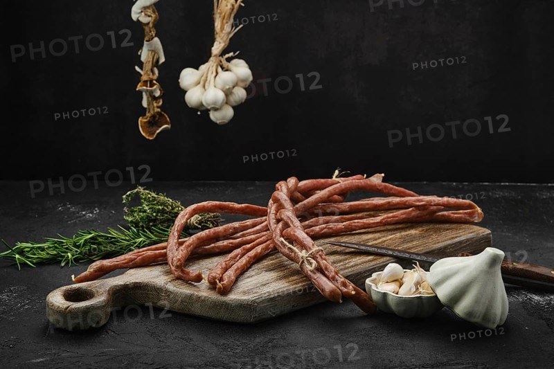 Long thin homemade beef sausages with garlic