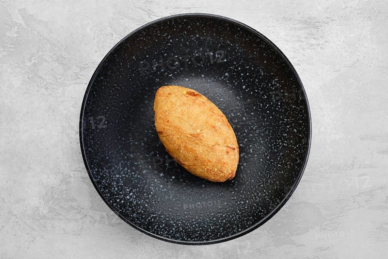 Kiev or pozharskaya cutlet on a plate overhead view