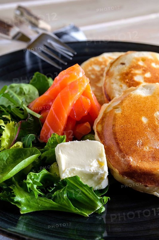 Flapjacks with salmon and fresh salad