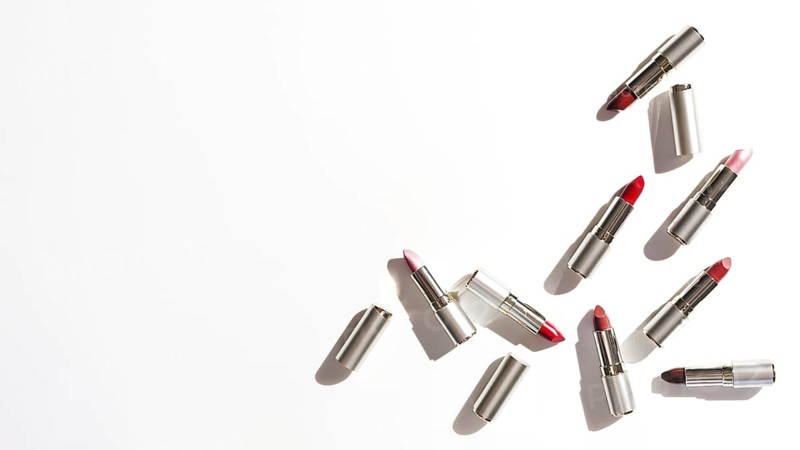 Group metallic lipsticks white background