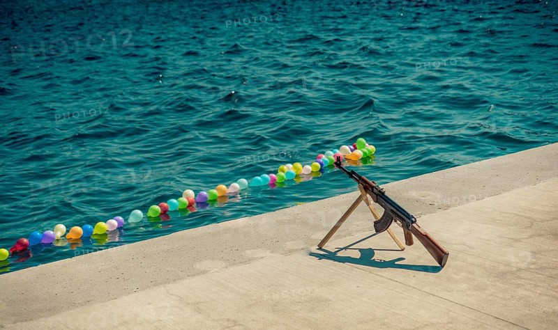 Balloon on a string on water for shooting game