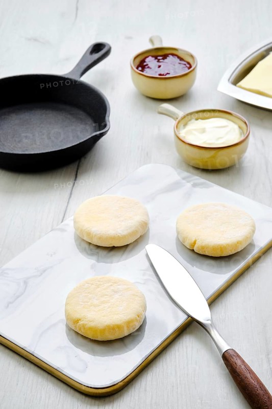 Fresh cottage cheese pancake on marble serving board