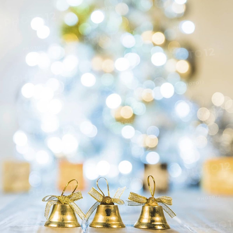 Decorative bells near christmas tree