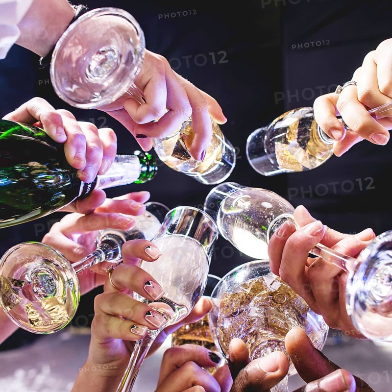 Hands friends with wineglasses