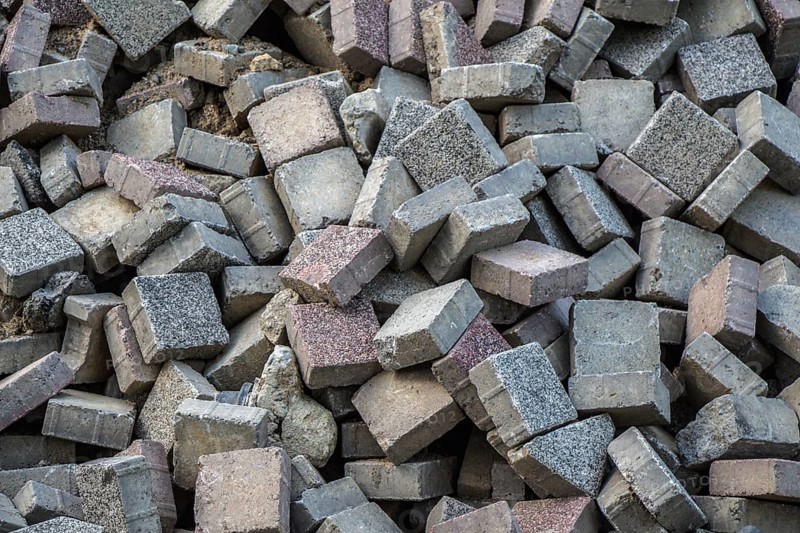 Concrete pavement tile stones as building material