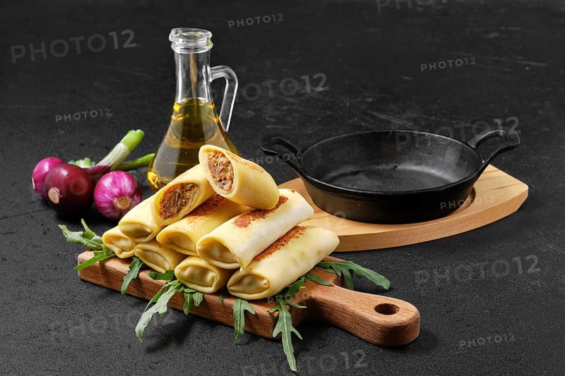 Thin crepe stuffed with chicken offal