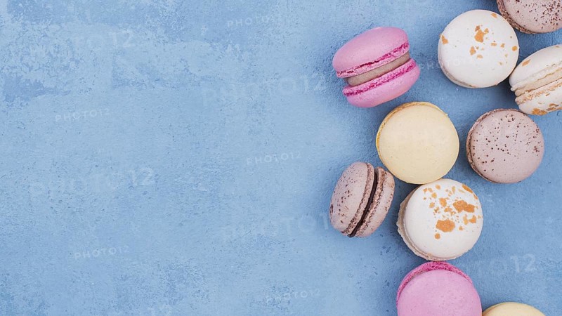 Flat lay assortment macarons with copy space