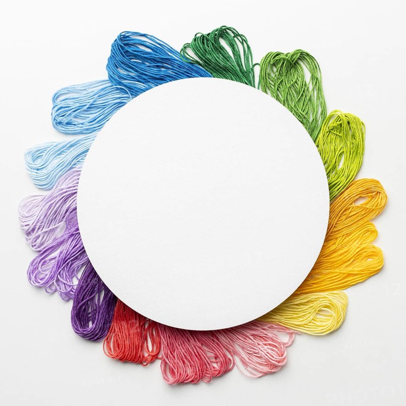 Circular frame with colorful thread