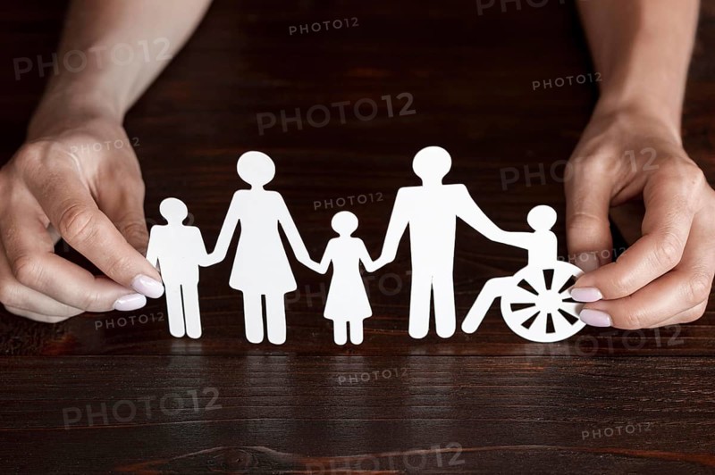 Cutout paper different family members being together