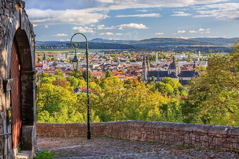 Old Way of the Cross to Frauenberg with view of St. Salvator's Cathedral and the town in early autumn