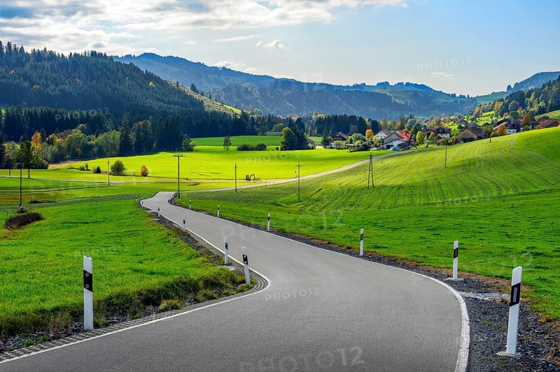 Forests and meadows and country road near Missen-Willhams