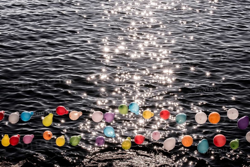 Balloon on a string on water for shooting game