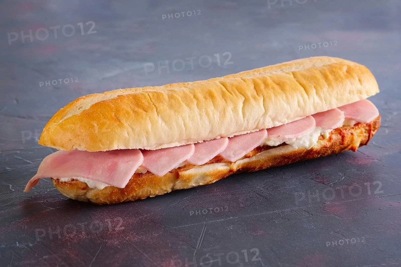 Simple sandwich with ham and soft cheese