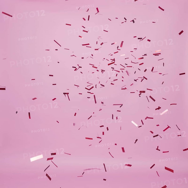 Dark confetti falling pink background