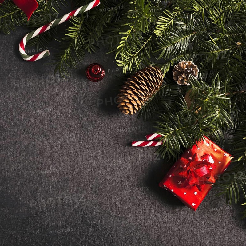 Fir branches near decorations christmas