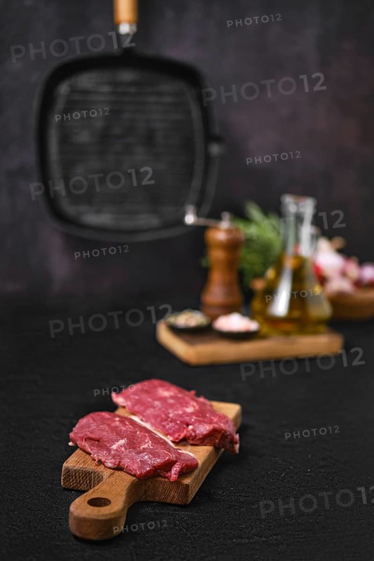 Fresh lamb steak on kitchen table