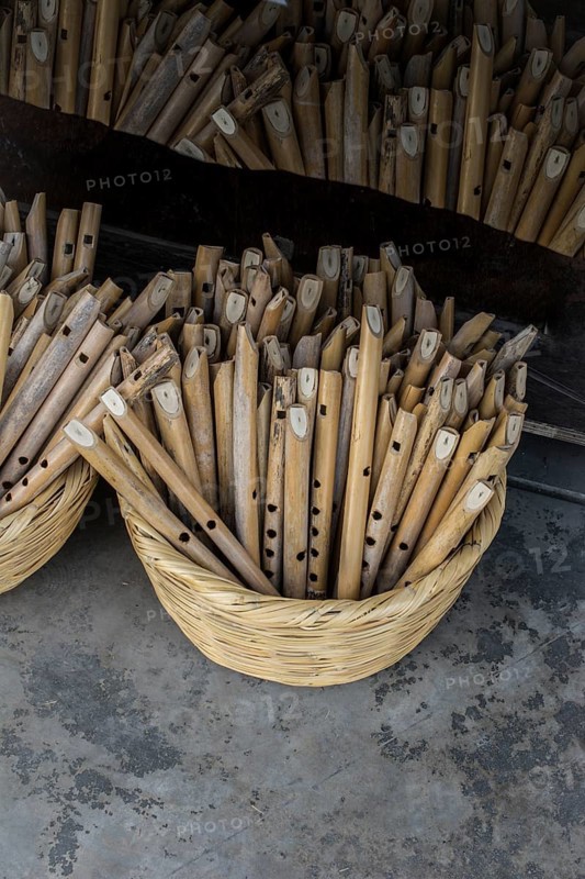 Dozens of handmade wooden flutes in the view