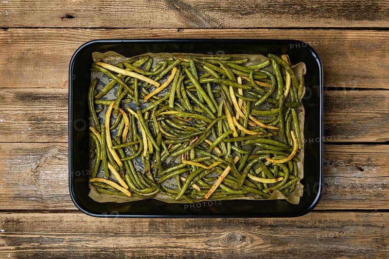 Top view of green beans baked in oven
