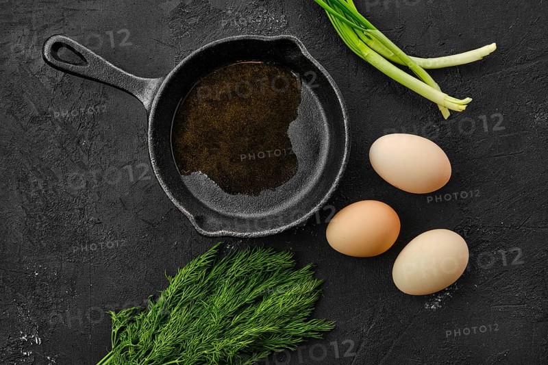 Fresh country eggs and cast iron skillet