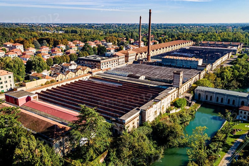 Aerial of the Unesco world heritage site "company town". Crespi dÂ´Adda
