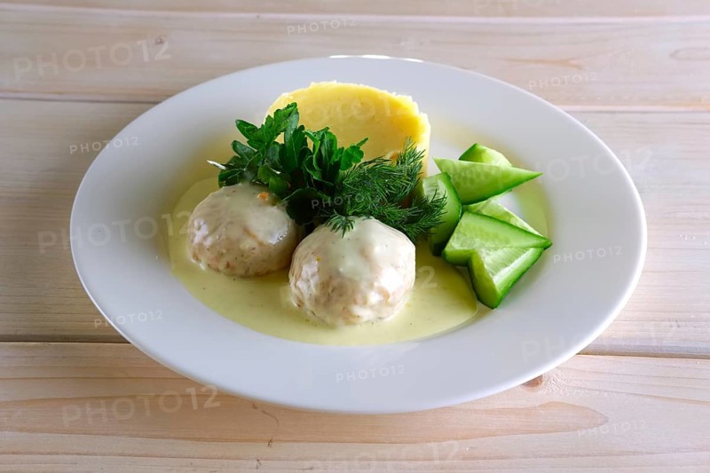 Meatballs with creamy sauce and mashed potato