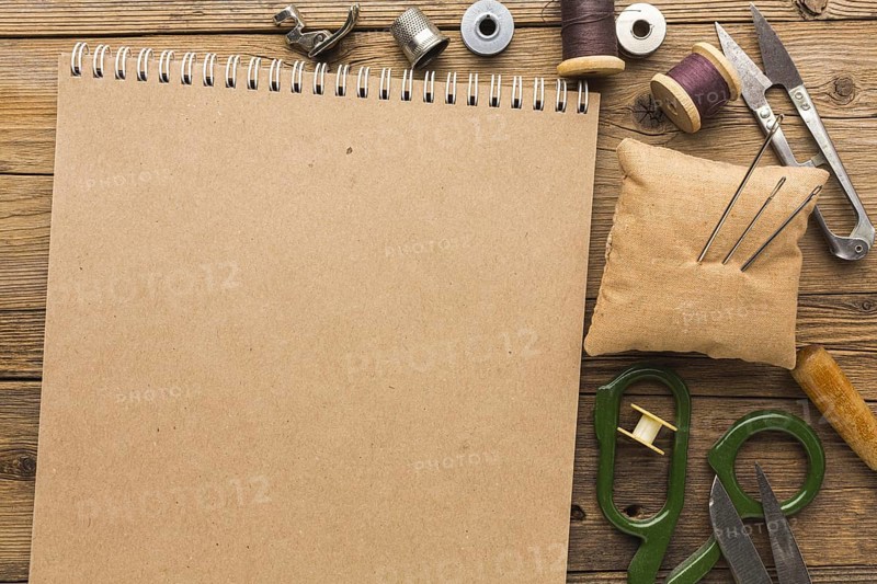 Top view notebook with scissors thread. Resolution and high quality beautiful photo