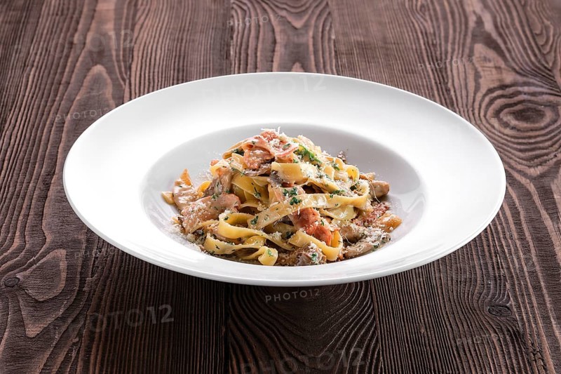 Pasta with bacon and squid