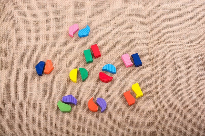 Colorful wooden pieces of a logic puzzle
