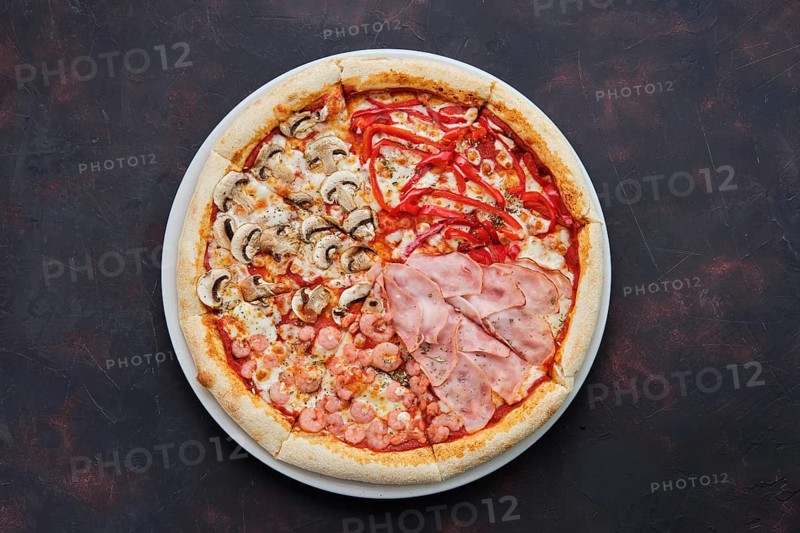 Top view of pizza four seasons with mushrooms