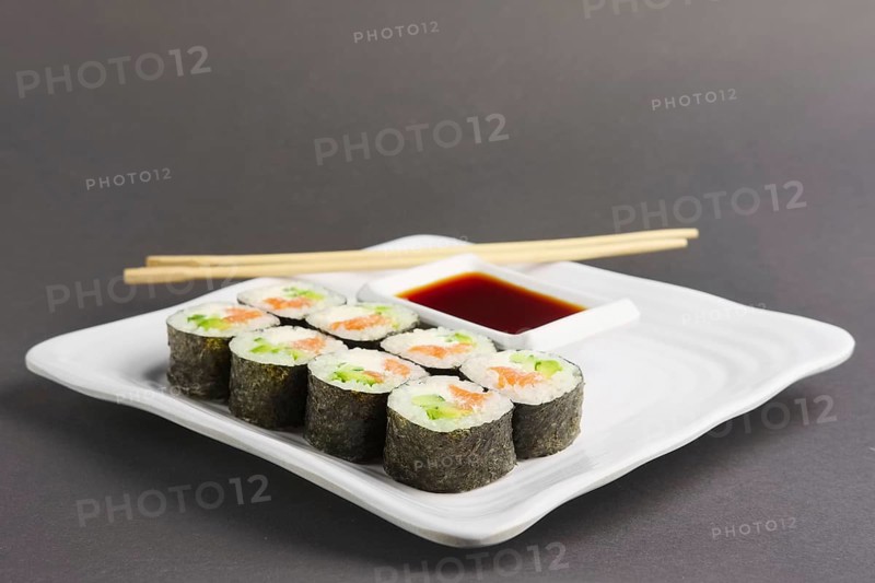 Set of rolls with salmon on plate