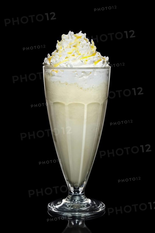 Banana milk cocktail with whipped cream