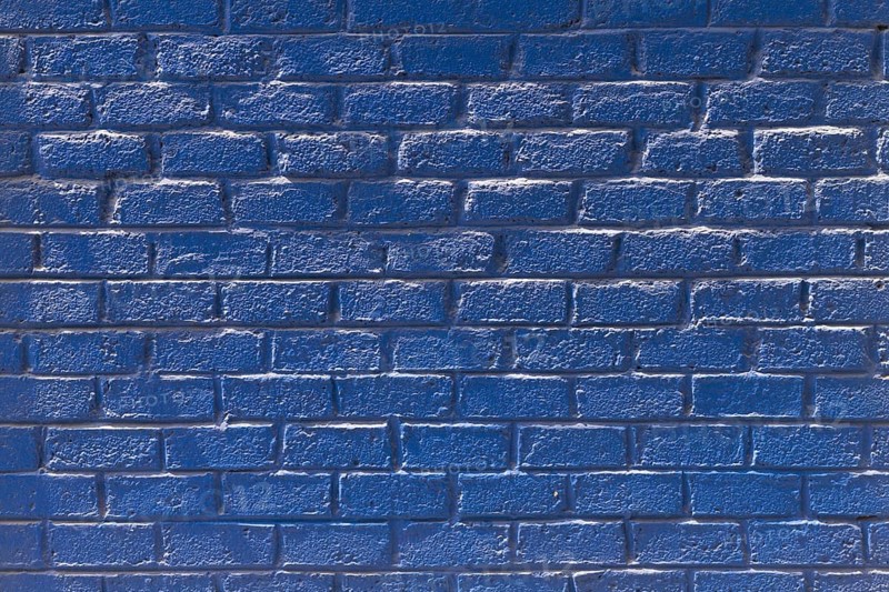 Copy space front view blue brick wall