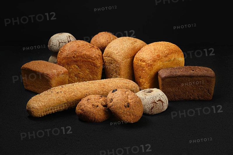 Assortment of artisan bread made of different types of grain with different shapes