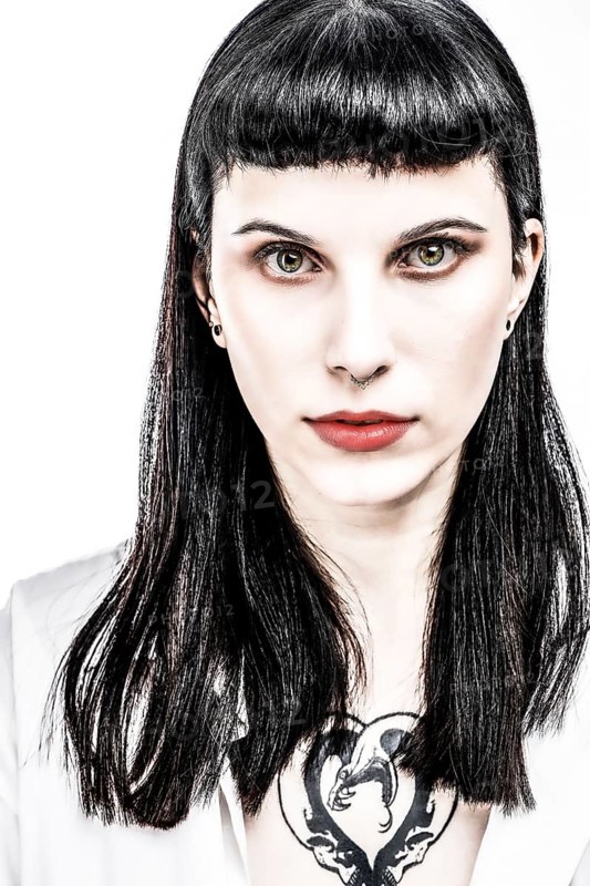 Portrait young woman with long black hair