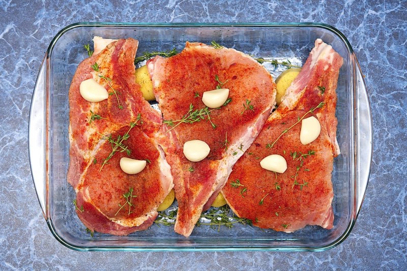 Raw meat on rib with spice ready for baking