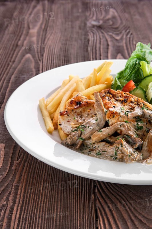 Grilled chicken fillet with oyster mushrooms