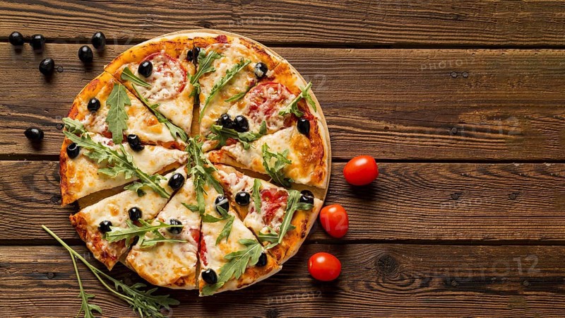 Delicious italian pizza wooden table
