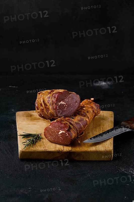 Smoked beef fillet meat on cutting board