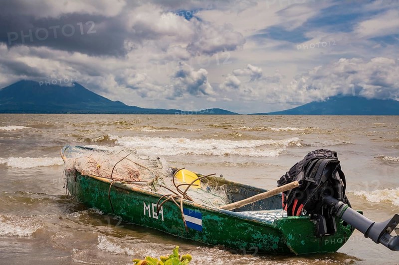 A fishing boat on a lake in Nicaragua. Concept of fishing boats parked at the seaside