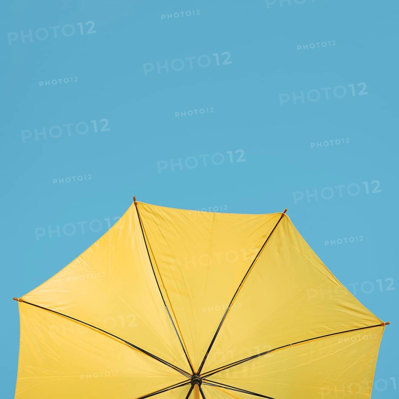 Copy space yellow umbrella