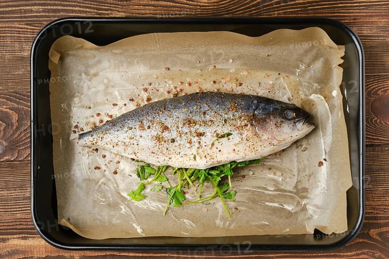Fresh sea yellow tailed horse mackerel in baking tray
