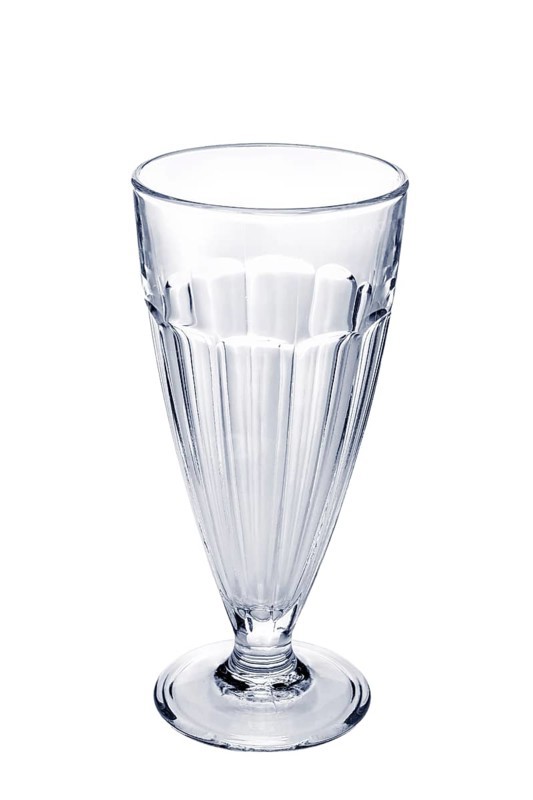 Empty faceted coffee cocktail glass