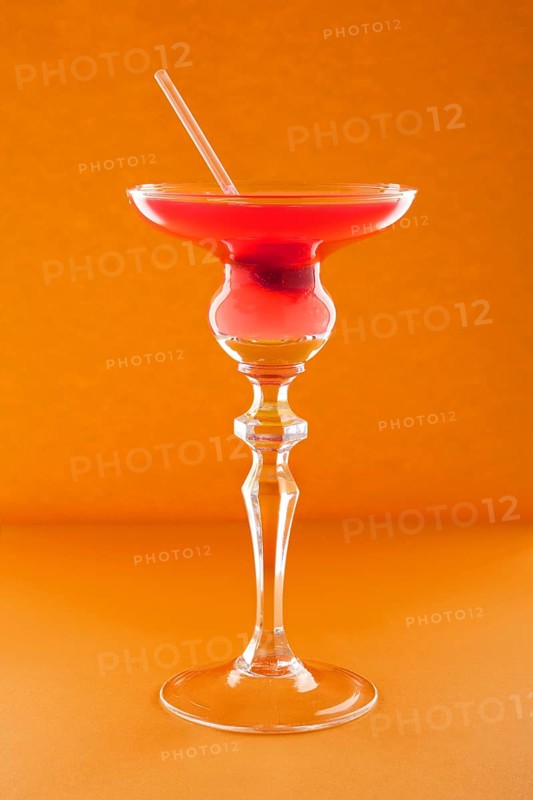 Scofflaw cocktail on orange background