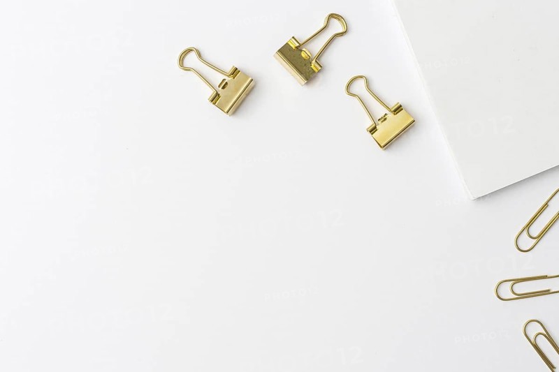 Top view golden paperclips with copy space. Resolution and high quality beautiful photo