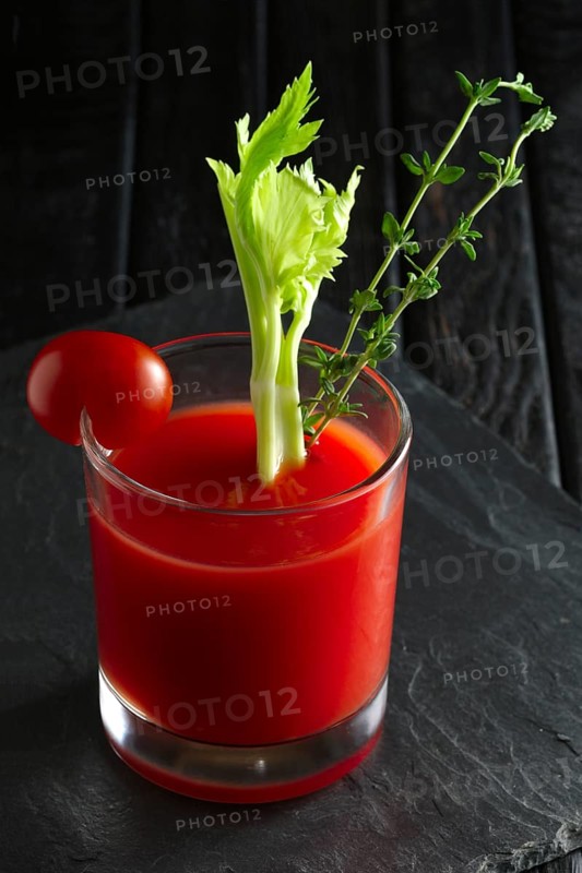 Cocktail Bloody Mary on dark wooden background