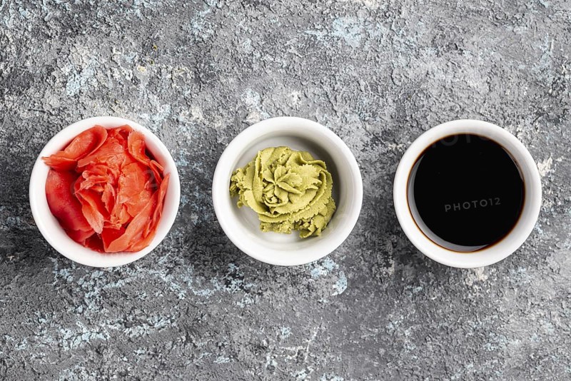 Flat lay ginger wasabi soy sauce bowls