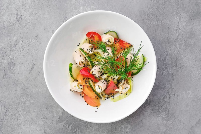 Top view of salad with ham