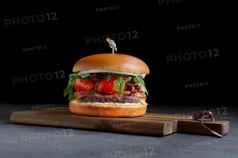 Tasty grilled beef burger with lettuce