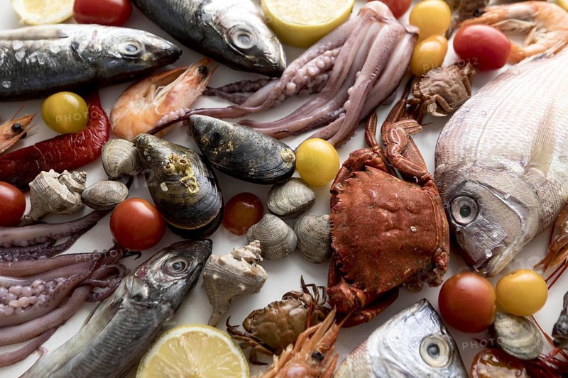 Top view assortment seafood with tomatoes. Resolution and high quality beautiful photo